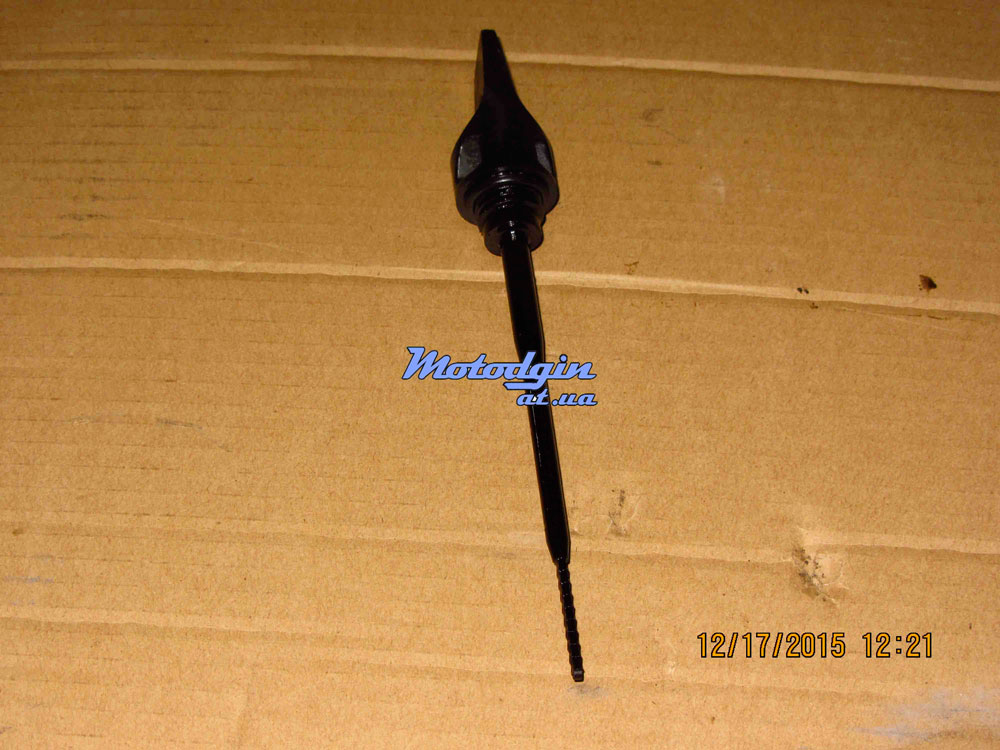 Щуп уровня масла.